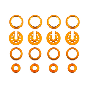 TEAM ASSOCIATED DC10 SHOCK COLLARS/SPRING CUPS ETC. GOLD